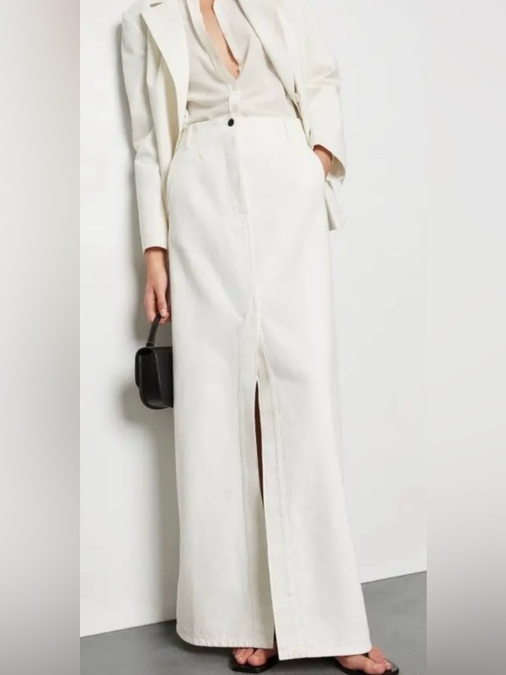 Kallmeyer Harper column skirt. White High-Waist Maxi Skirt with Front Slit